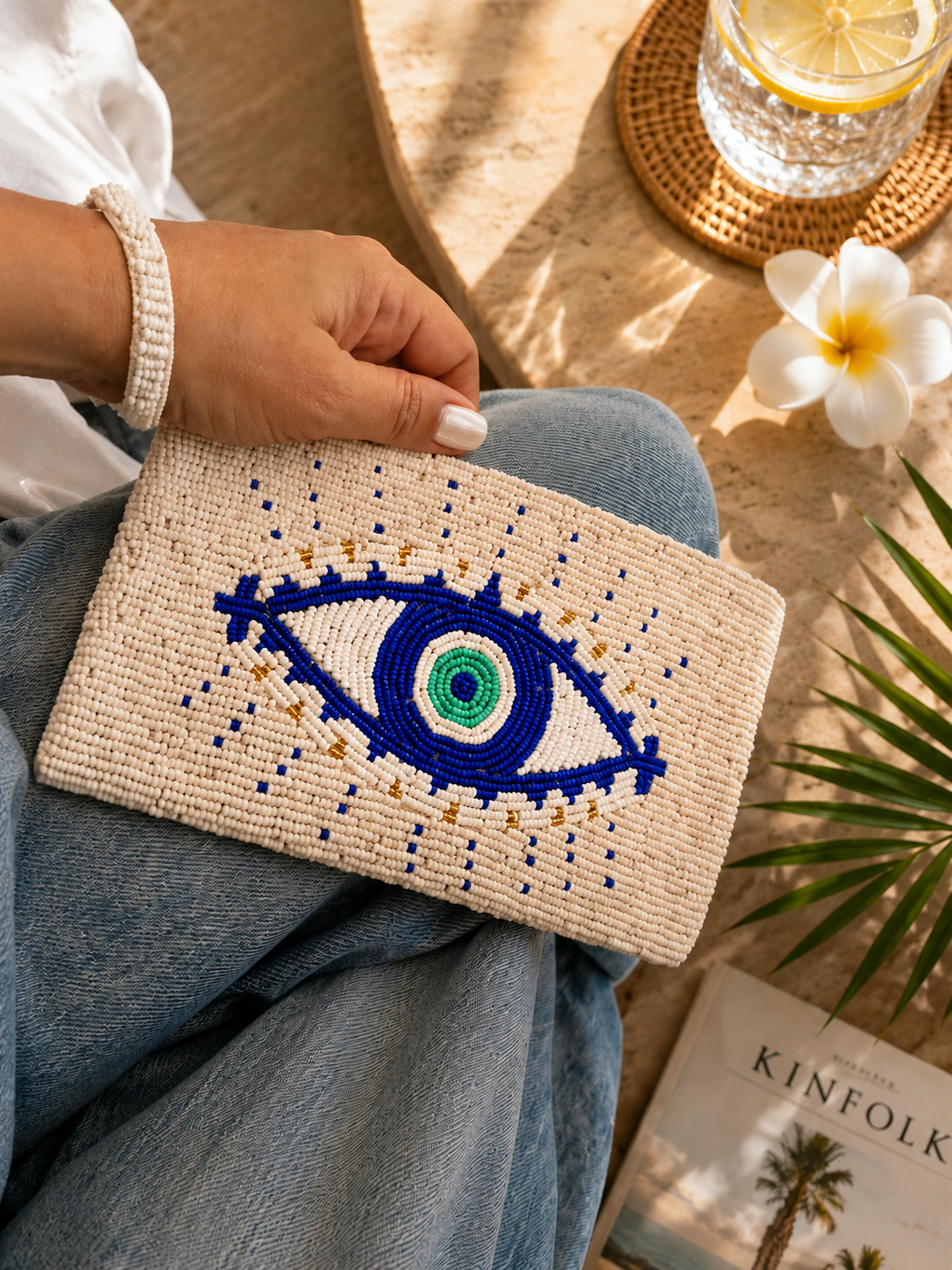 Aegean Eye ivory hand-beaded clutch with cobalt blue and turquoise Evil Eye motif