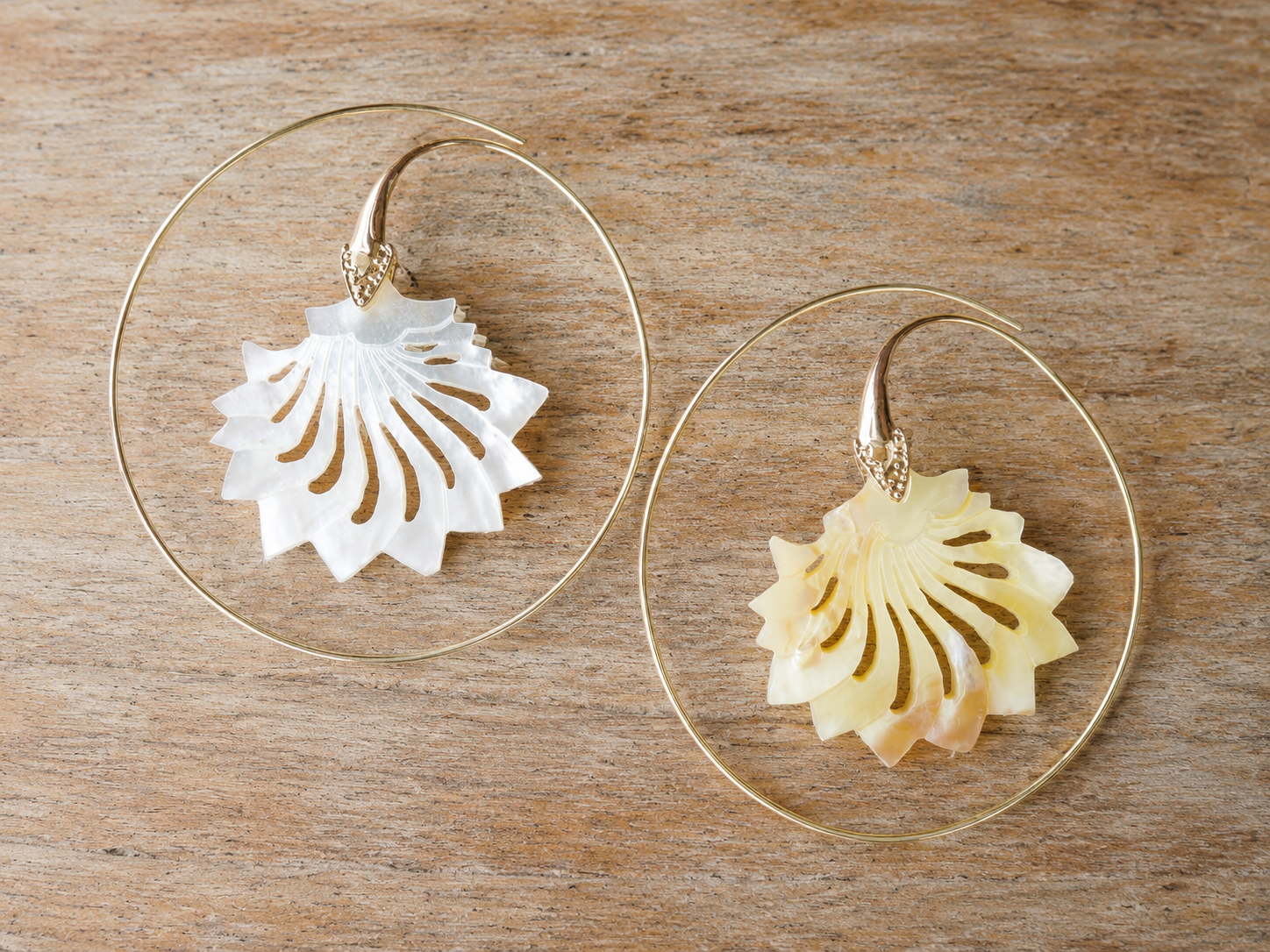 Alaya golden brass hoop earrings with carved Mother of Pearl drops