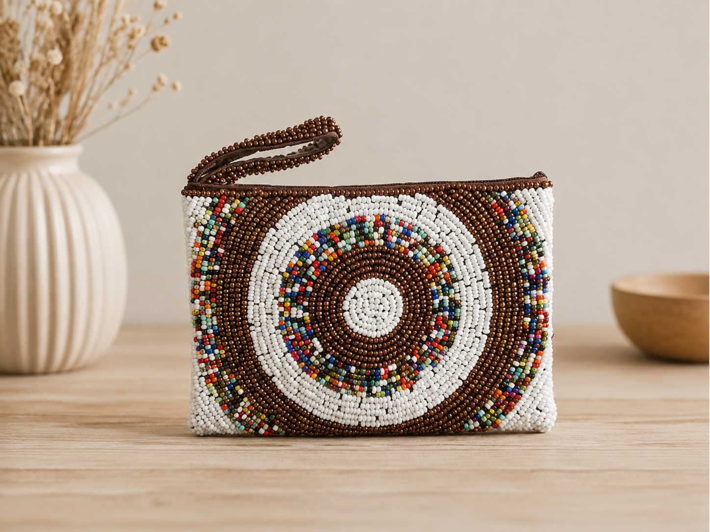 Solara mini white and bronze beaded pouch with multicolour concentric circle design