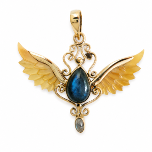 Astra Wings golden brass pendant with blue Labradorite and carved shell wings
