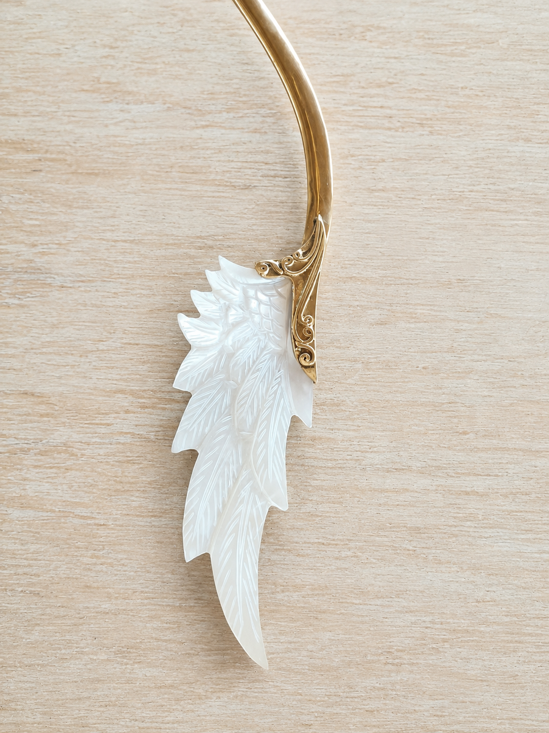 Seraphine Wings golden brass choker with carved Mother of Pearl wings